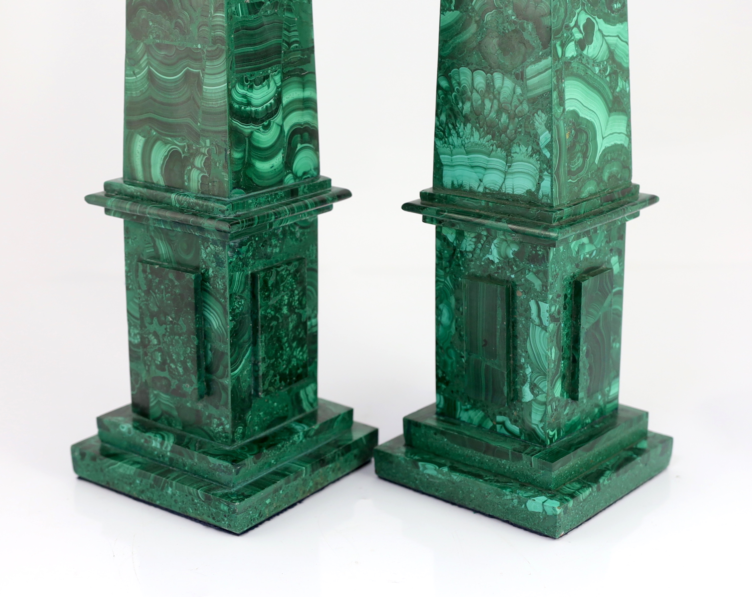 A pair of malachite veneered obelisks 12 x 12cm, 60cm high